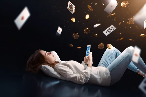 OKPK App — Enjoy seamless gaming on your smartphone A young woman relaxing with her phone while dynamic casino elements float around her, illustrating the smooth mobile experience offered by the OKPK app.