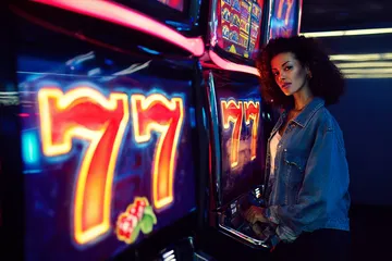 OKPK App — Fast, responsive, and optimized for all devices A cheerful woman in traditional clothing using her smartphone during a festive moment, showing how easily the OKPK app fits into everyday life.