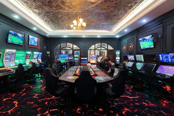 OKPK Casino — Step inside our high-end casino experience A glamorous woman holding casino chips in a neon-lit environment, representing the premium online casino atmosphere of OKPK.
